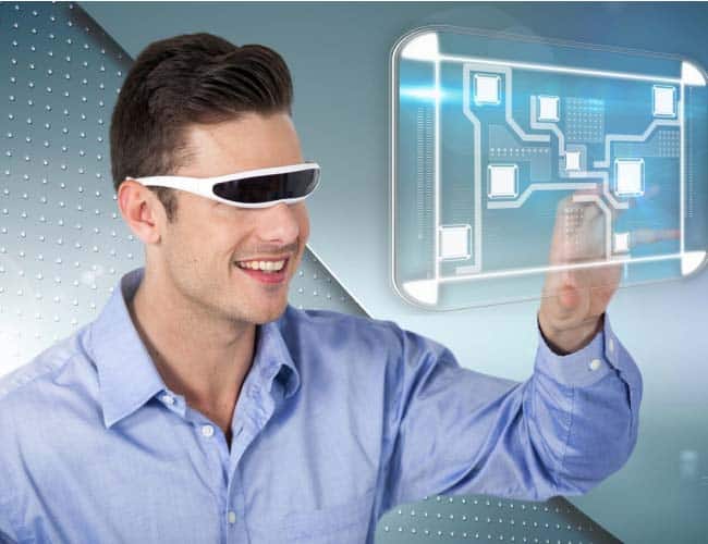 BIZ-LYNX Technology - A man wearing virtual reality glasses interacts with a holographic touch screen, smiling while touching digital icons, seamlessly integrating hosted IP telephony into his immersive experience.