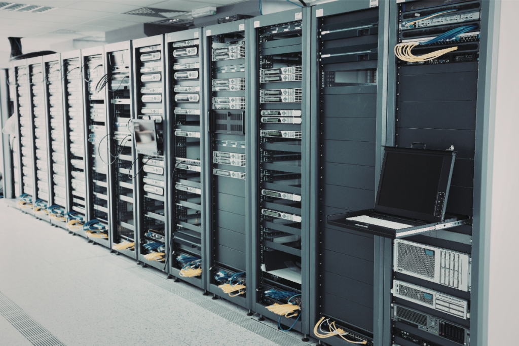 Business network infrastructure with server cabinets and structured cabling in a data facility