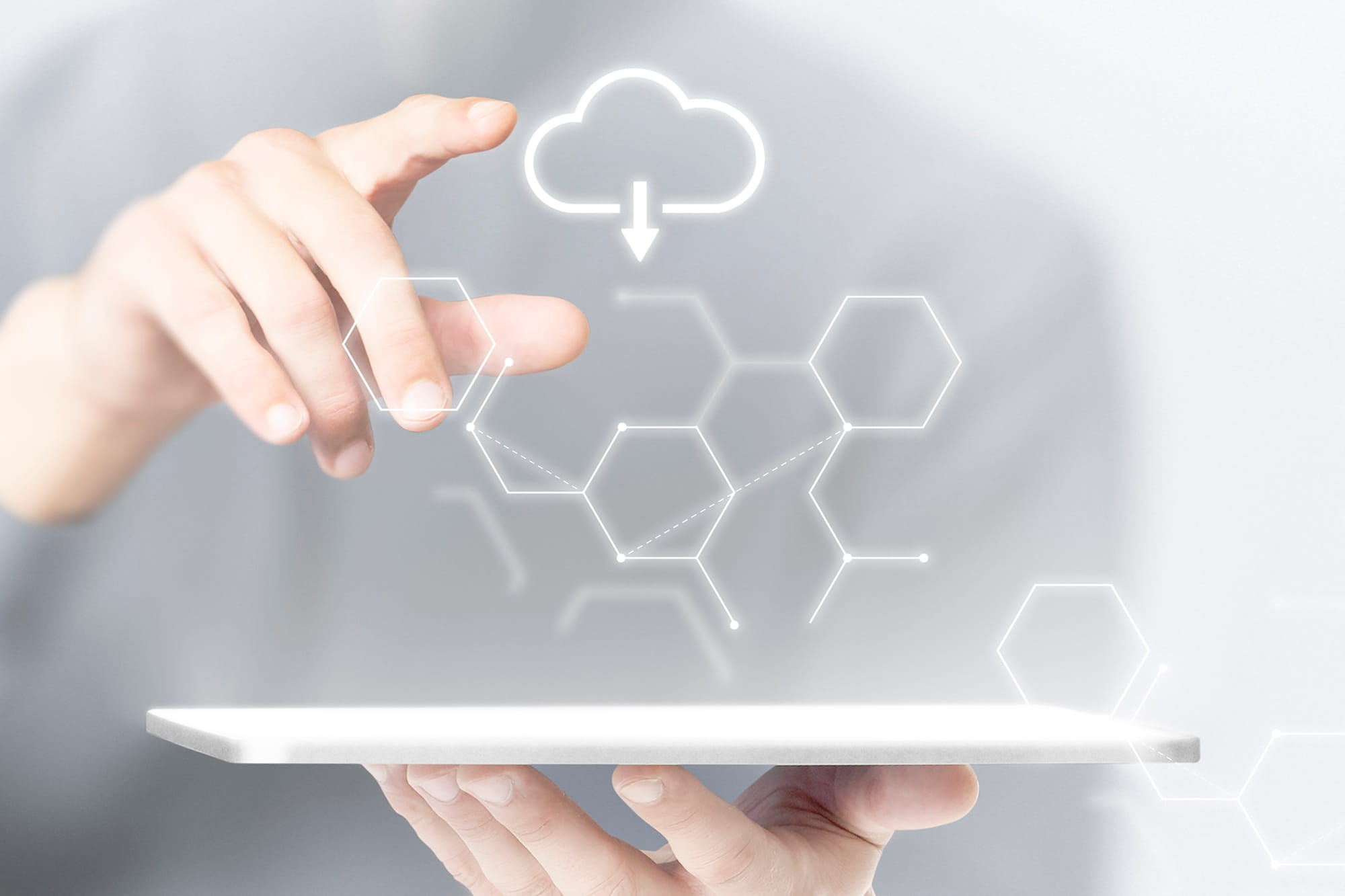 User interacting with a cloud-based digital system interface on a tablet device.