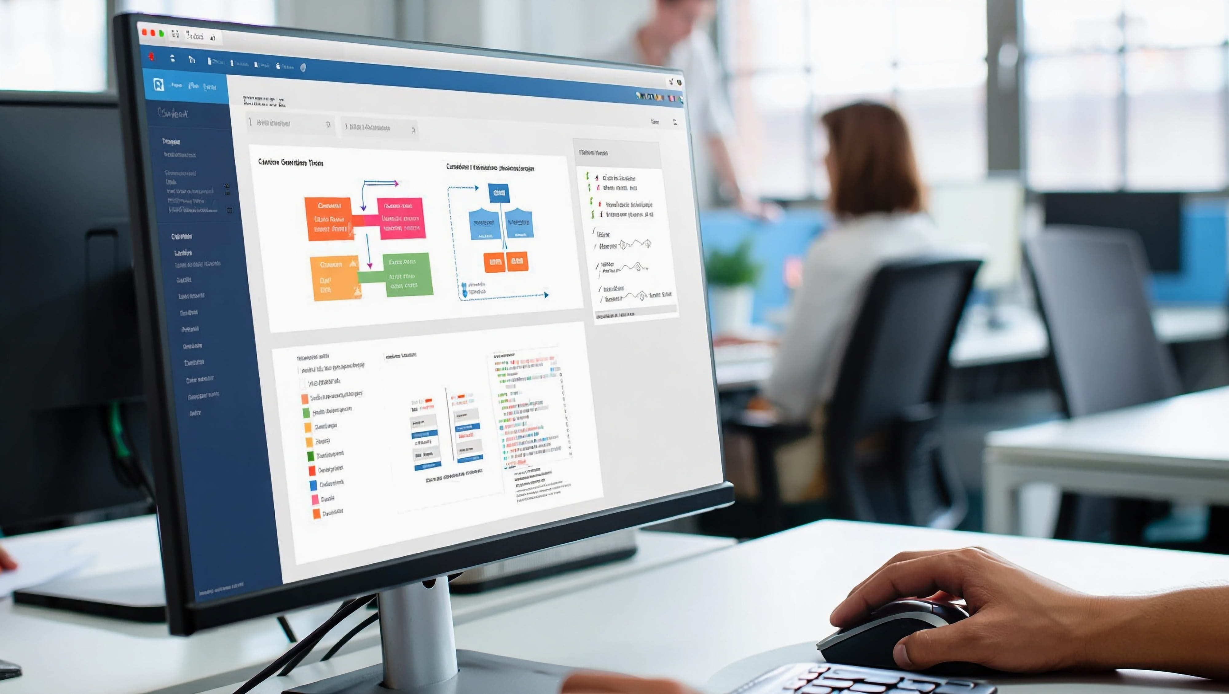 Business professional working with a document management interface in an office