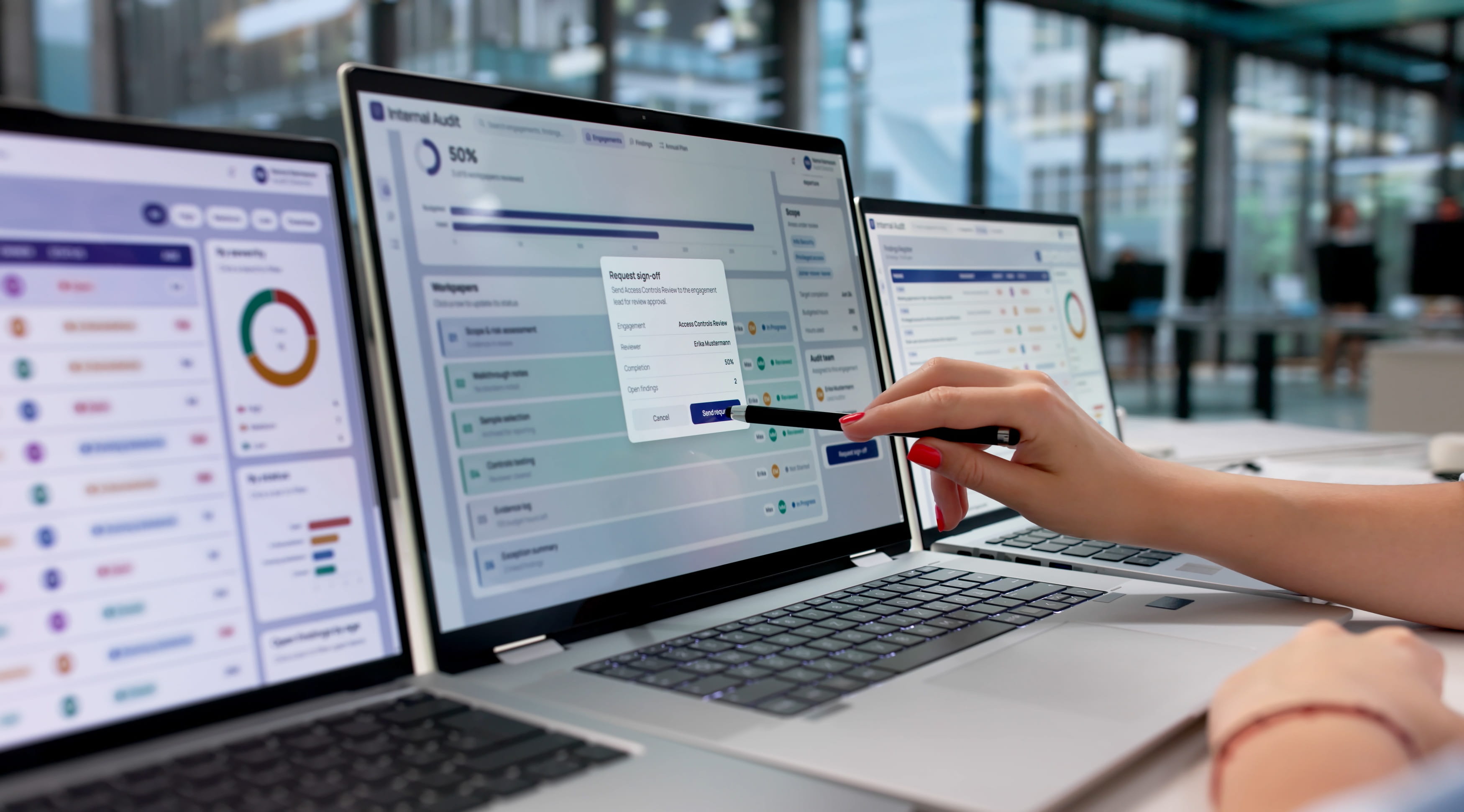 Business professional reviewing a workflow and document approval dashboard